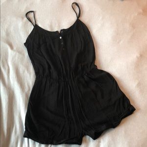 All black, spaghetti strap romper.